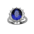 Bagues sur Artemare : Bague en argent rhodi&eacute; collection joaillerie orn&eacute;e d'un oxyde bleu au centre entour&eacute; de petits oxydes blancs