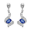 Boucles d'oreille sur Artemare : Boucles d'oreilles pendantes en Argent rhodi&eacute; collection joaillerie vagues orn&eacute;es d'oxydes blancs avec oxyde ovale bleu et fermoir poussette
