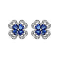 Boucles d'oreilles en argent rhodi&eacute; collection joaillerie tr&egrave;fle &agrave; 4 feuilles en oxydes bleus avec contours en oxydes blancs sertis et fermoir poussette