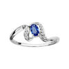 Bague en argent rhodi&eacute; collection joaillerie oxyde ovale bleu au centre et vagues orn&eacute;es d'oxydes blancs sertis sur les c&ocirc;t&eacute;s