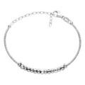 Bracelets sur Artemare : Bracelet en argent rhodi&eacute; semi rigide avec boules facett&eacute;es r&eacute;glable