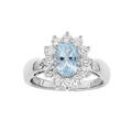Bague en argent rhodi&eacute; massif avec Topaze bleue ovale et oxydes blancs sertis