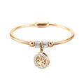 Bracelets sur Artemare : Bracelet en acier et PVD jaune rigide avec pastille motif arbre de vie