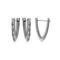 Boucles d'oreille sur Artemare : Boucles d'oreille en acier patin&eacute; forme v avec motifs