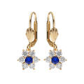 Boucles d'oreille sur Artemare : Boucles d'oreille dormeuse en plaqu&eacute; or marguerite oxydes centre bleu fonc&eacute; et contour blancs sertis