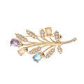 Broches sur Artemare : Broche en plaqu&eacute; or motif feuillage avec oxydes couleurs pastels et blancs sertis