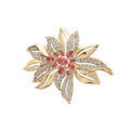 Broche en plaqu&eacute; or motif fleur avec oxydes fuschia et blancs sertis Artemare