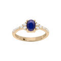 Bague en plaqu&eacute; or avec gros oxyde bleu et blancs sertis