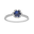 Bague en argent rhodi&eacute; fleur oxydes bleu fonc&eacute; et blancs sertis Artemare