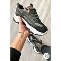 Baskets Jeunes Et Jolies Baskets python noires "Anais"
