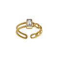 Bagues sur Artemare : Bague ajustable en acier dor&eacute; avec oxyde blanc rectangulaire entour&eacute;,