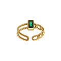 Bague ajustable en acier dor&eacute; avec oxyde vert rectangulaire entour&eacute; Artemare