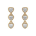 Boucles d'oreille sur Artemare : Boucles d'oreille tige en plaqu&eacute; or pendante 3 coeurs oxydes blancs