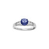 Bague en argent rhodi&eacute; grand diam&egrave;tre,un oxyde bleu serti par 4 griffes et oxydes blancs sertis sur les c&ocirc;t&eacute;s