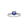 Bague en argent rhodi&eacute; grand diam&egrave;tre, un oxyde bleu serti 4 griffes et oxydes blancs sur les c&ocirc;t&eacute;s Artemare