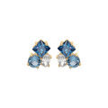 Boucles d'oreille tige en vermeil trois oxydes bleus et blancs sertis