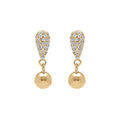 Boucles d'oreille sur Artemare : Boucles d'oreille en argent dor&eacute; forme goutte pav&eacute;e d'oxydes blancs et boule lisse