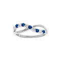 Bague en argent rhodi&eacute; crois&eacute;e avec oxydes bleu et blancs sertis
