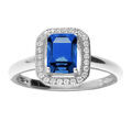 Bague en argent rhodi&eacute; pave avec oxyde bleu serti et contour d' oxydes micro sertis