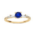 Bague en plaqu&eacute; or style alliance rail oxyde bleu central et oxydes blancs sertis