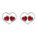 Boucles d'oreille sur Artemare : Boucles d'oreille tige en argent rhodi&eacute; forme coeur ajour&eacute; et deux oxydes rouges