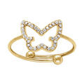 Bague en acier dor&eacute; avec papillon &eacute;vid&eacute; contour d' oxydes blancs sertis - r&eacute;glable