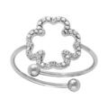 Bague en acier motif fleur &eacute;vid&eacute;e contour d' oxydes blancs sertis - r&eacute;glable