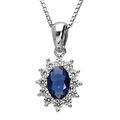 Colliers sur Artemare : Collier en argent rhodi&eacute; collection joaillerie cha&icirc;ne avec pendentif ovale et gros oxyde bleu au centre orn&eacute; de petits oxydes blancs autour formant une marguerite