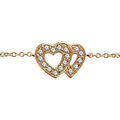 Bracelets sur Artemare : Bracelet en plaqu&eacute; or cha&icirc;ne avec au milieu 2 coeurs superpos&eacute;s &eacute;vid&eacute;s et orn&eacute;s d'oxydes blancs sertis - longueur 16cm + 2cm de rallonge
