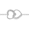 Bracelet en argent rhodi&eacute; cha&icirc;ne avec au milieu 2 coeurs emmaill&eacute;s avec 1 moiti&eacute; sur chaque orn&eacute;e d'oxydes blancs sertis - longueur 16cm + 2cm de rallonge