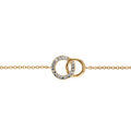 Bracelets sur Artemare : Bracelet en plaqu&eacute; or cha&icirc;ne avec 2 petits anneaux emmaill&eacute;s,1 lisse et l'autre orn&eacute; d'oxydes blancs sertis - longueur 16cm + 2cm de rallonge
