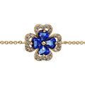 Bracelet en plaqu&eacute; or cha&icirc;ne avec au milieu tr&egrave;fle &agrave; 4 feuilles en oxydes bleus avec contours en oxydes blancs sertis - longueur 16cm + 2cm de rallonge Artemare