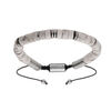 Bracelet en acier avec pierres Howlite v&eacute;ritable mont&eacute;es sur cordon noir coulissant
