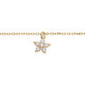 Bracelet en argent et dorure jaune cha&icirc;ne avec pampille fleur en oxydes blancs 15+3cm