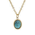 Collier en acier et PVD jaune cha&icirc;ne avec pendentif cabochon turquoise de synth&egrave;se 40+5cm