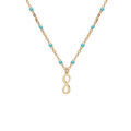 Colliers sur Artemare : Collier en argent et dorure jaune cha&icirc;ne avec boules de couleur turquoise et motif infini 40+5cm