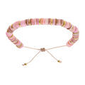 Bracelets sur Artemare : Bracelet en acier et PVD dor&eacute; r&eacute;glable rondelles coquillage teint&eacute; rose