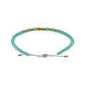 Bracelet en acier cordon coulissant rondelles turquoise imitation et boules PVD dor&eacute; Artemare