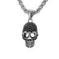 Colliers sur Artemare : Collier en acier pendentif t&ecirc;te de mort oxydes noirs 50+5cm