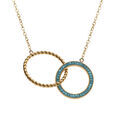 Collier en acier dor&eacute; double cercles l'un torsad&eacute; et l'autre en r&eacute;sine et strass bleus, 40+50cm