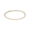 Bracelet extensible perles facet&eacute;es en verre teint&eacute; blanc nacr&eacute; et acier dor&eacute;