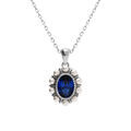 Colliers sur Artemare : Collier en argent rhodi&eacute; pendentif oxyde central bleu et contour perle blanche imitation - 42+3cm