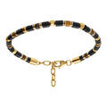 Bracelets sur Artemare : Bracelet en acier dor&eacute; de boules agate noir et oeil de tigre - 19+3cm