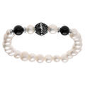 Bracelets sur Artemare : Bracelet en acier elastique perle blanche de culture d'eau douce -8-9mm irr&eacute;guli&egrave;re - et deux boules agate noire
