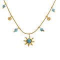 Collier en acier dor&eacute; pampilles boules turquoise reconstitu&eacute;es avec pendentif soleil - 39+5cm