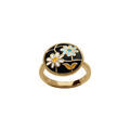 Bague Stella Mia en acier dor&eacute; stella mia ronde motif r&eacute;sine fond noire fleur Artemare