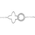 Bracelet en argent rhodhi&eacute; compos&eacute; d'un anneau pav&eacute; de pierres blanches et d'un pendentif ajour&eacute; en forme de tr&egrave;fle - 16+3cm