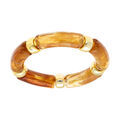 Bracelet extensible couleur ambre miel &agrave; anneaux dor&eacute;s Artemare