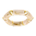 Bracelet extensible couleur nacre &agrave; inserts dor&eacute;