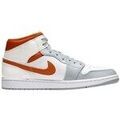 Baskets homme sur Grenoble : Baskets montantes Nike Air Jordan 1 Mid Starfish Orange